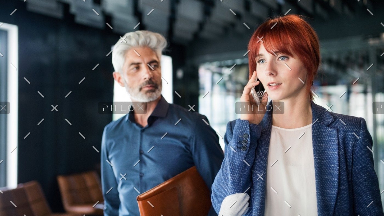 demo-attachment-551-business-people-in-the-office-making-a-phone-call-PQZTHDY